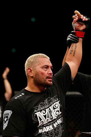 SAITAMA, JAPAN - MARCH 03:  Mark Hunt reacts after knocking out Stefan Struve in their heavyweight fight during the UFC on FUEL TV event at Saitama Super Arena on March 3, 2013 in Saitama, Japan.  (Photo by Josh Hedges/Zuffa LLC/Zuffa LLC via Getty Images)