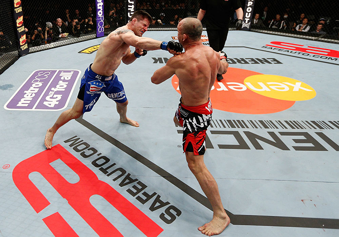 SAITAMA, JAPAN - MARCH 03:  (L-R) Brian Stann punches Wanderlei Silva in their light heavyweight fight during the UFC on FUEL TV event at Saitama Super Arena on March 3, 2013 in Saitama, Japan.  (Photo by Josh Hedges/Zuffa LLC/Zuffa LLC via Getty Images)