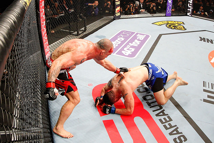 SAITAMA, JAPAN - MARCH 03:  (L-R) Wanderlei Silva punches Brian Stann in their light heavyweight fight during the UFC on FUEL TV event at Saitama Super Arena on March 3, 2013 in Saitama, Japan.  (Photo by Josh Hedges/Zuffa LLC/Zuffa LLC via Getty Images)