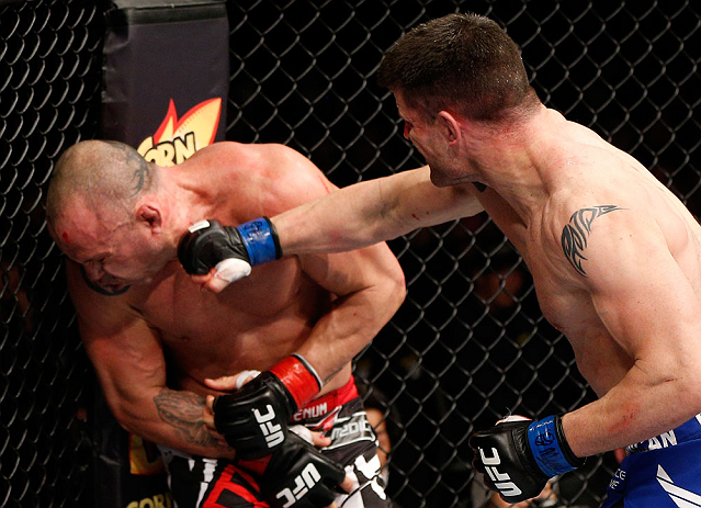 SAITAMA, JAPAN - MARCH 03:  (R-L) Brian Stann punches Wanderlei Silva in their light heavyweight fight during the UFC on FUEL TV event at Saitama Super Arena on March 3, 2013 in Saitama, Japan.  (Photo by Josh Hedges/Zuffa LLC/Zuffa LLC via Getty Images)