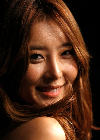 SAITAMA, JAPAN - MARCH 03:  UFC Octagon Girl Su-Jung Lee poses for a photo during the UFC on FUEL TV event at Saitama Super Arena on March 3, 2013 in Saitama, Japan.  (Photo by Josh Hedges/Zuffa LLC/Zuffa LLC via Getty Images)