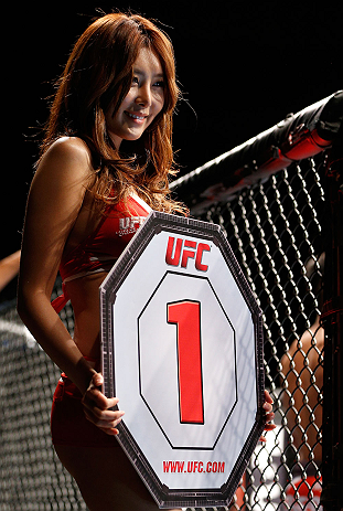 SAITAMA, JAPAN - MARCH 03:  UFC Octagon Girl Su-Jung Lee introduces a round during the UFC on FUEL TV event at Saitama Super Arena on March 3, 2013 in Saitama, Japan.  (Photo by Josh Hedges/Zuffa LLC/Zuffa LLC via Getty Images)