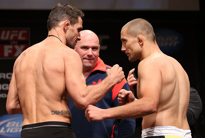 MINNEAPOLIS, MN - OCTOBER 04:  (L-R) Opponents Aaron Simpson and Mike Pierce face off during the UFC on FX weigh in at Pantages Theater on October 4, 2012 in Minneapolis, Minnesota.  (Photo by Josh Hedges/Zuffa LLC/Zuffa LLC via Getty Images)