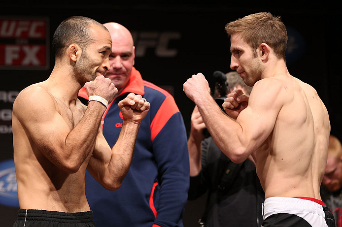 MINNEAPOLIS, MN - OCTOBER 04:  (L-R) Opponents Darren Uyenoyama and Phil Harris face off during the UFC on FX weigh in at Pantages Theater on October 4, 2012 in Minneapolis, Minnesota.  (Photo by Josh Hedges/Zuffa LLC/Zuffa LLC via Getty Images)