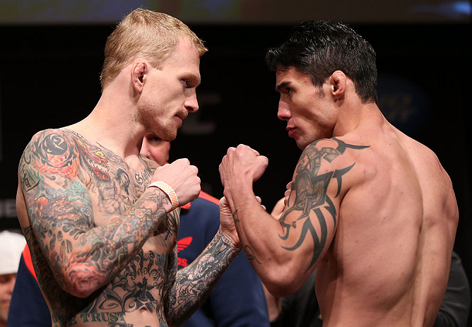 MINNEAPOLIS, MN - OCTOBER 04:  (L-R) Opponents Bart Palaszewski and Diego Nunes face off during the UFC on FX weigh in at Pantages Theater on October 4, 2012 in Minneapolis, Minnesota.  (Photo by Josh Hedges/Zuffa LLC/Zuffa LLC via Getty Images)