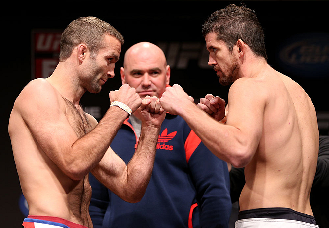 MINNEAPOLIS, MN - OCTOBER 04:  (L-R) Opponents Jacob Volkmann and Shane Roller face off during the UFC on FX weigh in at Pantages Theater on October 4, 2012 in Minneapolis, Minnesota.  (Photo by Josh Hedges/Zuffa LLC/Zuffa LLC via Getty Images)