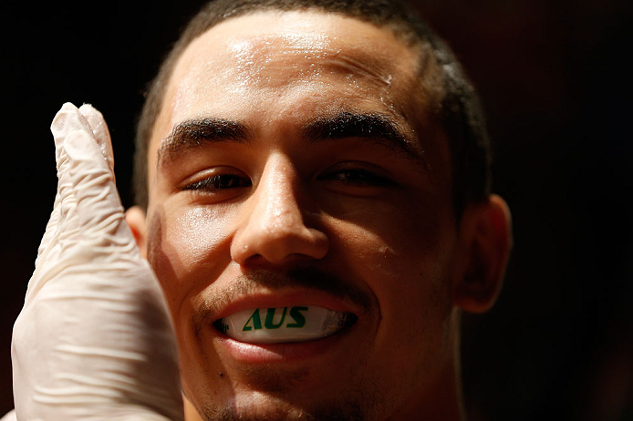 GOLD COAST, AUSTRALIA - DECEMBER 15:  Robert Whittaker prepares to enter the Octagon before his welterweight fight against Bradley Scott at the UFC on FX event on December 15, 2012  at Gold Coast Convention and Exhibition Centre in Gold Coast, Australia.  (Photo by Josh Hedges/Zuffa LLC/Zuffa LLC via Getty Images)