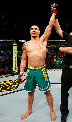 GOLD COAST, AUSTRALIA - DECEMBER 15:  Robert Whittaker reacts after defeating Bradley Scott during their welterweight fight at the UFC on FX event on December 15, 2012  at Gold Coast Convention and Exhibition Centre in Gold Coast, Australia.  (Photo by Josh Hedges/Zuffa LLC/Zuffa LLC via Getty Images)