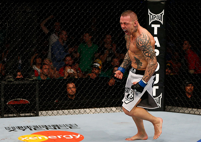 GOLD COAST, AUSTRALIA - DECEMBER 15:  Ross Pearson reacts after his knockout victory over George Sotiropoulos during their lightweight fight at the UFC on FX event on December 15, 2012  at Gold Coast Convention and Exhibition Centre in Gold Coast, Australia.  (Photo by Josh Hedges/Zuffa LLC/Zuffa LLC via Getty Images)