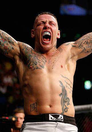 GOLD COAST, AUSTRALIA - DECEMBER 15:  Ross Pearson reacts after his knockout victory over George Sotiropoulos during their lightweight fight at the UFC on FX event on December 15, 2012  at Gold Coast Convention and Exhibition Centre in Gold Coast, Australia.  (Photo by Josh Hedges/Zuffa LLC/Zuffa LLC via Getty Images)