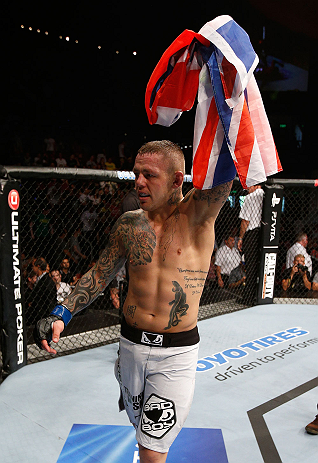 GOLD COAST, AUSTRALIA - DECEMBER 15:  Ross Pearson reacts after his knockout victory over George Sotiropoulos during their lightweight fight at the UFC on FX event on December 15, 2012  at Gold Coast Convention and Exhibition Centre in Gold Coast, Australia.  (Photo by Josh Hedges/Zuffa LLC/Zuffa LLC via Getty Images)