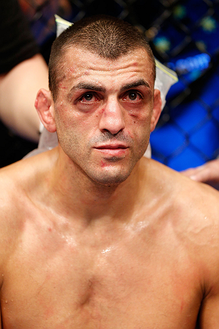 GOLD COAST, AUSTRALIA - DECEMBER 15:  George Sotiropoulos reacts after his knockout loss to Ross Pearson during their lightweight fight at the UFC on FX event on December 15, 2012  at Gold Coast Convention and Exhibition Centre in Gold Coast, Australia.  (Photo by Josh Hedges/Zuffa LLC/Zuffa LLC via Getty Images)