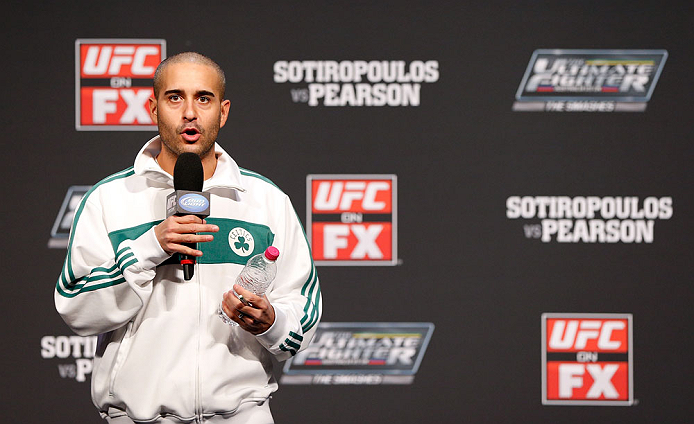 GOLD COAST, AUSTRALIA - DECEMBER 14:  UFC host Jon Anik interacts with fans during a Q&A session before the UFC on FX weigh in on December 14, 2012 at Gold Coast Convention and Exhibition Centre in Gold Coast, Queensland, Australia.  (Photo by Josh Hedges/Zuffa LLC/Zuffa LLC via Getty Images)
