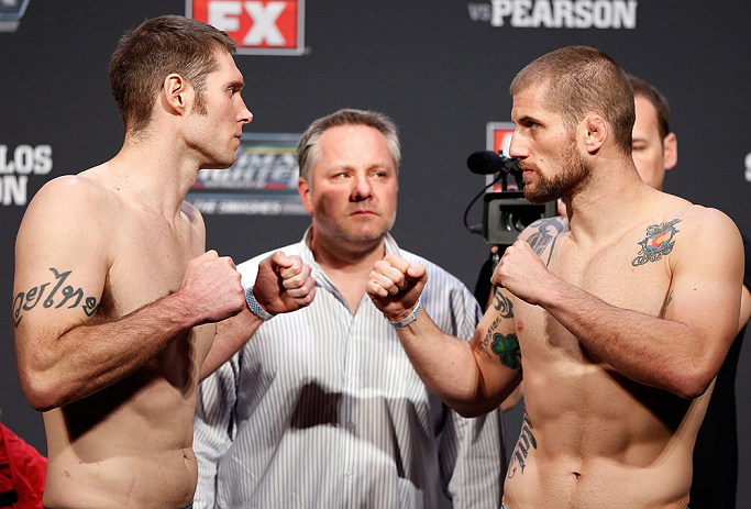 GOLD COAST, AUSTRALIA - DECEMBER 14: (L-R) Opponents Nick Penner and Cody Donovan face off during the UFC on FX weigh in on December 14, 2012 at Gold Coast Convention and Exhibition Centre in Gold Coast, Queensland, Australia. (Photo by Josh Hedges/Zuffa LLC/Zuffa LLC via Getty Images)