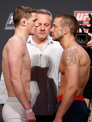 GOLD COAST, AUSTRALIA - DECEMBER 14: (L-R) Opponents Brendan Loughnane and Mike Wilkinson face off during the UFC on FX weigh in on December 14, 2012 at Gold Coast Convention and Exhibition Centre in Gold Coast, Queensland, Australia. (Photo by Josh Hedges/Zuffa LLC/Zuffa LLC via Getty Images)