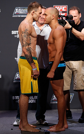GOLD COAST, AUSTRALIA - DECEMBER 14: (L-R) Opponents Benny Alloway and Manuel Rodriguez face off during the UFC on FX weigh in on December 14, 2012 at Gold Coast Convention and Exhibition Centre in Gold Coast, Queensland, Australia. (Photo by Josh Hedges/Zuffa LLC/Zuffa LLC via Getty Images)
