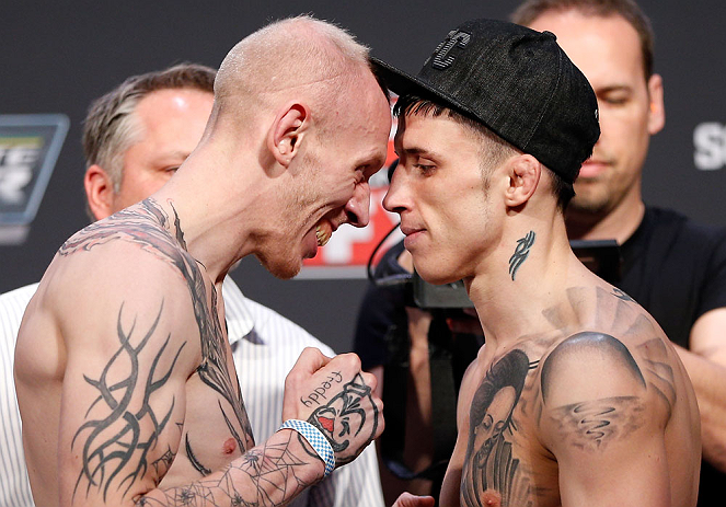 GOLD COAST, AUSTRALIA - DECEMBER 14: (L-R) Opponents Colin Fletcher and Norman Parke face off during the UFC on FX weigh in on December 14, 2012 at Gold Coast Convention and Exhibition Centre in Gold Coast, Queensland, Australia. (Photo by Josh Hedges/Zuffa LLC/Zuffa LLC via Getty Images)