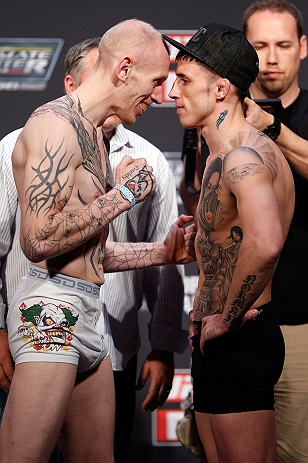 GOLD COAST, AUSTRALIA - DECEMBER 14: (L-R) Opponents Colin Fletcher and Norman Parke face off during the UFC on FX weigh in on December 14, 2012 at Gold Coast Convention and Exhibition Centre in Gold Coast, Queensland, Australia. (Photo by Josh Hedges/Zuffa LLC/Zuffa LLC via Getty Images)