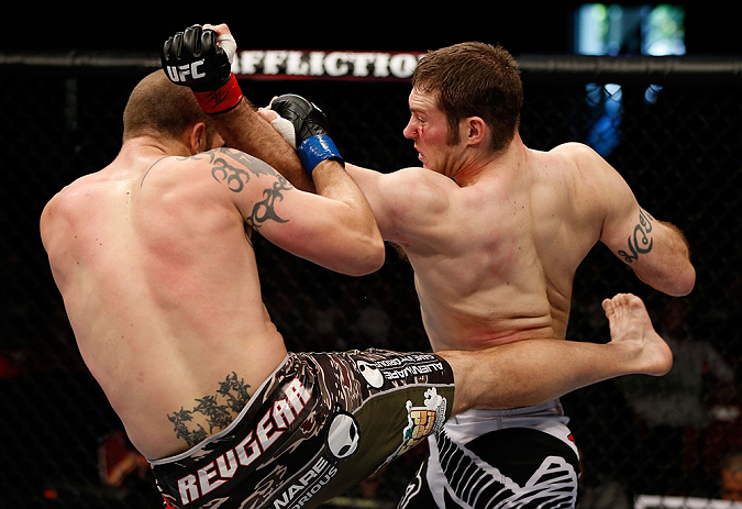 GOLD COAST, AUSTRALIA - DECEMBER 15:  (R-L) Nick Penner punches Cody Donovan during their light heavyweight fight at the UFC on FX event on December 15, 2012  at Gold Coast Convention and Exhibition Centre in Gold Coast, Australia.  (Photo by Josh Hedges/Zuffa LLC/Zuffa LLC via Getty Images)