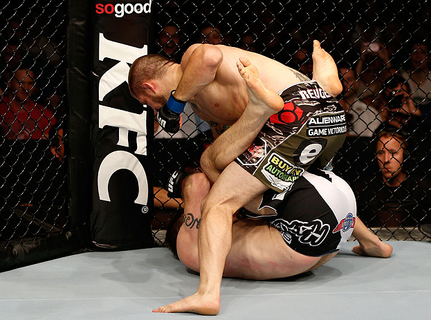 GOLD COAST, AUSTRALIA - DECEMBER 15:  (R-L) Cody Donovan punches Nick Penner during their light heavyweight fight at the UFC on FX event on December 15, 2012  at Gold Coast Convention and Exhibition Centre in Gold Coast, Australia.  (Photo by Josh Hedges/Zuffa LLC/Zuffa LLC via Getty Images)