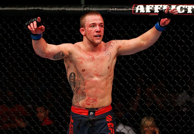 GOLD COAST, AUSTRALIA - DECEMBER 15:  Mike Wilkinson reacts after defeating Brendan Loughnane during their lightweight fight at the UFC on FX event on December 15, 2012  at Gold Coast Convention and Exhibition Centre in Gold Coast, Australia.  (Photo by Josh Hedges/Zuffa LLC/Zuffa LLC via Getty Images)