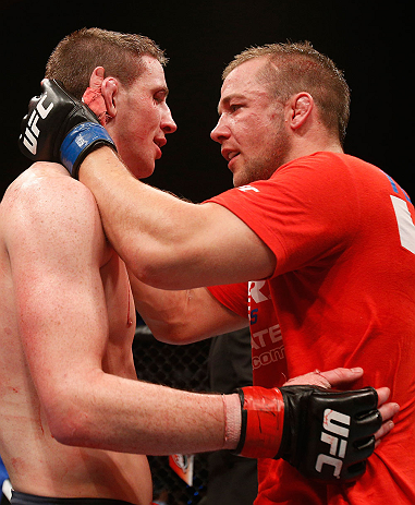GOLD COAST, AUSTRALIA - DECEMBER 15:  (R-L) Mike Wilkinson congratulates Brendan Loughnane after their three-round lightweight fight at the UFC on FX event on December 15, 2012  at Gold Coast Convention and Exhibition Centre in Gold Coast, Australia.  (Photo by Josh Hedges/Zuffa LLC/Zuffa LLC via Getty Images)