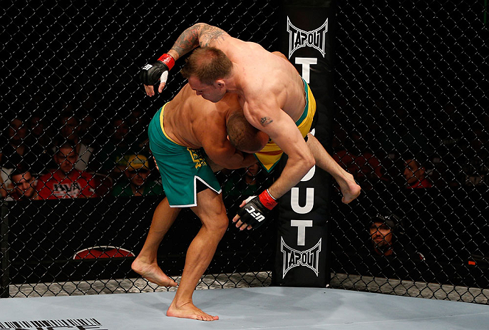 GOLD COAST, AUSTRALIA - DECEMBER 15:  (L-R) Manuel Rodriguez takes down Benny Alloway during their welterweight fight at the UFC on FX event on December 15, 2012  at Gold Coast Convention and Exhibition Centre in Gold Coast, Australia.  (Photo by Josh Hedges/Zuffa LLC/Zuffa LLC via Getty Images)