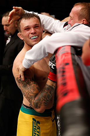 GOLD COAST, AUSTRALIA - DECEMBER 15:  Benny Alloway reacts after knocking out Manuel Rodriguez during their welterweight fight at the UFC on FX event on December 15, 2012  at Gold Coast Convention and Exhibition Centre in Gold Coast, Australia.  (Photo by Josh Hedges/Zuffa LLC/Zuffa LLC via Getty Images)