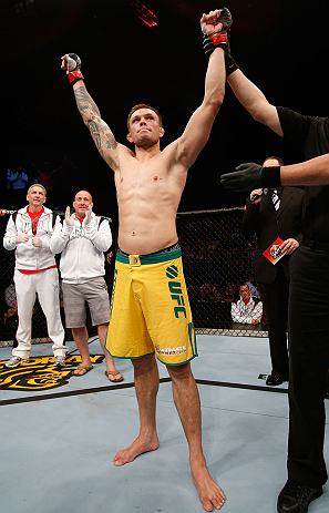GOLD COAST, AUSTRALIA - DECEMBER 15:  Benny Alloway reacts after knocking out Manuel Rodriguez during their welterweight fight at the UFC on FX event on December 15, 2012  at Gold Coast Convention and Exhibition Centre in Gold Coast, Australia.  (Photo by Josh Hedges/Zuffa LLC/Zuffa LLC via Getty Images)