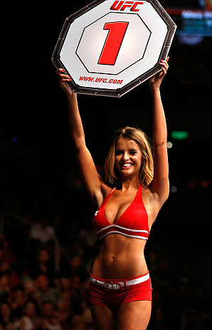 GOLD COAST, AUSTRALIA - DECEMBER 15:  UFC Octagon Girl Kahili Blundell introduces a round during the UFC on FX event on December 15, 2012  at Gold Coast Convention and Exhibition Centre in Gold Coast, Australia.  (Photo by Josh Hedges/Zuffa LLC/Zuffa LLC via Getty Images)