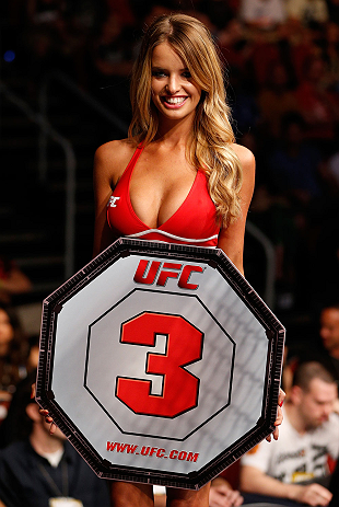 GOLD COAST, AUSTRALIA - DECEMBER 15:  UFC Octagon Girl Kahili Blundell introduces a round during the UFC on FX event on December 15, 2012  at Gold Coast Convention and Exhibition Centre in Gold Coast, Australia.  (Photo by Josh Hedges/Zuffa LLC/Zuffa LLC via Getty Images)