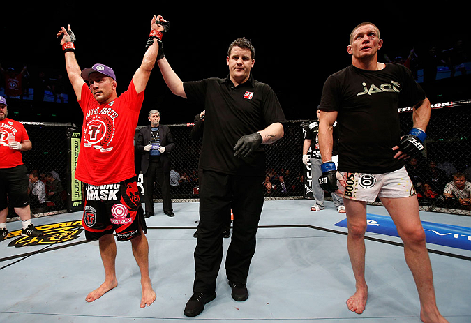 GOLD COAST, AUSTRALIA - DECEMBER 15:  Mike Pierce (L) reacts after defeating Seth Baczynski during their welterweight fight at the UFC on FX event on December 15, 2012  at Gold Coast Convention and Exhibition Centre in Gold Coast, Australia.  (Photo by Josh Hedges/Zuffa LLC/Zuffa LLC via Getty Images)