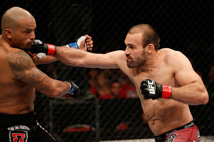 GOLD COAST, AUSTRALIA - DECEMBER 15:  (R-L) Igor Pokrajac punches Joey Beltran during their light heavyweight fight at the UFC on FX event on December 15, 2012  at Gold Coast Convention and Exhibition Centre in Gold Coast, Australia.  (Photo by Josh Hedges/Zuffa LLC/Zuffa LLC via Getty Images)