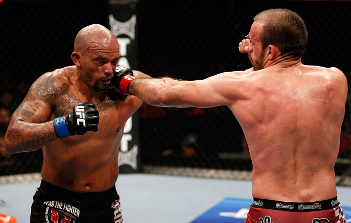 GOLD COAST, AUSTRALIA - DECEMBER 15:  (R-L) Igor Pokrajac punches Joey Beltran during their light heavyweight fight at the UFC on FX event on December 15, 2012  at Gold Coast Convention and Exhibition Centre in Gold Coast, Australia.  (Photo by Josh Hedges/Zuffa LLC/Zuffa LLC via Getty Images)
