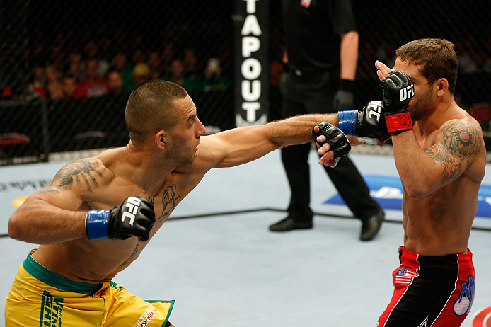 GOLD COAST, AUSTRALIA - DECEMBER 15:  (L-R) Yaotzin Meza punches Chad Mendes during their featherweight fight at the UFC on FX event on December 15, 2012  at Gold Coast Convention and Exhibition Centre in Gold Coast, Australia.  (Photo by Josh Hedges/Zuffa LLC/Zuffa LLC via Getty Images)