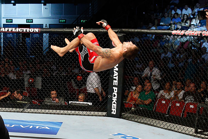 GOLD COAST, AUSTRALIA - DECEMBER 15:  Chad Mendes reacts after knocking out Yaotzin Meza during their featherweight fight at the UFC on FX event on December 15, 2012  at Gold Coast Convention and Exhibition Centre in Gold Coast, Australia.  (Photo by Josh Hedges/Zuffa LLC/Zuffa LLC via Getty Images)