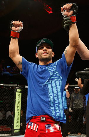 GOLD COAST, AUSTRALIA - DECEMBER 15:  Chad Mendes reacts after knocking out Yaotzin Meza during their featherweight fight at the UFC on FX event on December 15, 2012  at Gold Coast Convention and Exhibition Centre in Gold Coast, Australia.  (Photo by Josh Hedges/Zuffa LLC/Zuffa LLC via Getty Images)