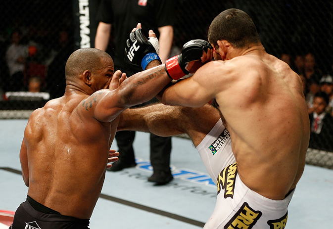 GOLD COAST, AUSTRALIA - DECEMBER 15:  (L-R) Hector Lombard punches Rousimar Palhares during their middleweight fight at the UFC on FX event on December 15, 2012  at Gold Coast Convention and Exhibition Centre in Gold Coast, Australia.  (Photo by Josh Hedges/Zuffa LLC/Zuffa LLC via Getty Images)