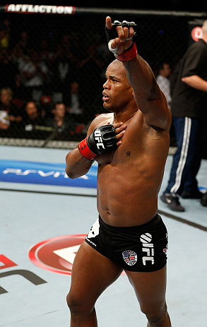 GOLD COAST, AUSTRALIA - DECEMBER 15:  Hector Lombard reacts after knocking out Rousimar Palhares during their middleweight fight at the UFC on FX event on December 15, 2012  at Gold Coast Convention and Exhibition Centre in Gold Coast, Australia.  (Photo by Josh Hedges/Zuffa LLC/Zuffa LLC via Getty Images)