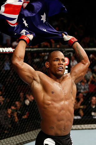 GOLD COAST, AUSTRALIA - DECEMBER 15:  Hector Lombard reacts after knocking out Rousimar Palhares during their middleweight fight at the UFC on FX event on December 15, 2012  at Gold Coast Convention and Exhibition Centre in Gold Coast, Australia.  (Photo by Josh Hedges/Zuffa LLC/Zuffa LLC via Getty Images)