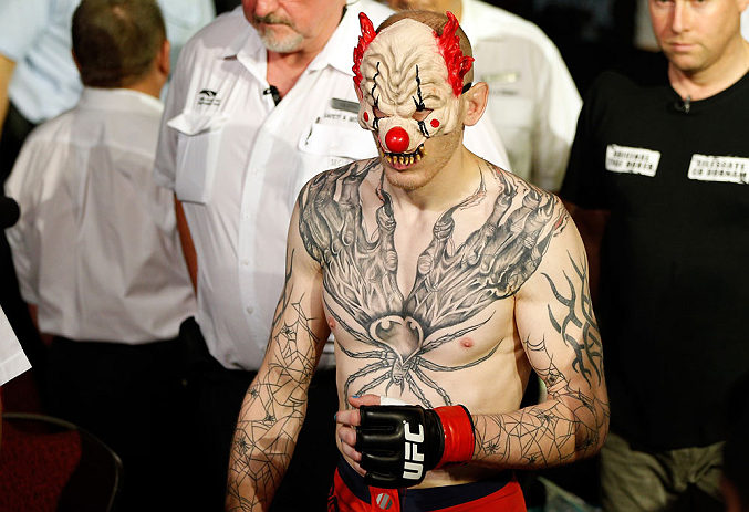 GOLD COAST, AUSTRALIA - DECEMBER 15:  Colin Fletcher enters the arena before his lightweight fight against Norman Parke at the UFC on FX event on December 15, 2012  at Gold Coast Convention and Exhibition Centre in Gold Coast, Australia.  (Photo by Josh Hedges/Zuffa LLC/Zuffa LLC via Getty Images)