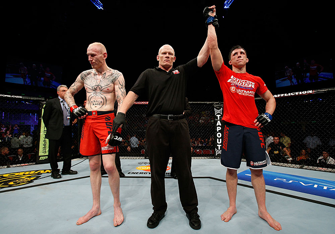 GOLD COAST, AUSTRALIA - DECEMBER 15:  Norman Parke (R) reacts after defeating Colin Fletcher during their lightweight fight at the UFC on FX event on December 15, 2012  at Gold Coast Convention and Exhibition Centre in Gold Coast, Australia.  (Photo by Josh Hedges/Zuffa LLC/Zuffa LLC via Getty Images)