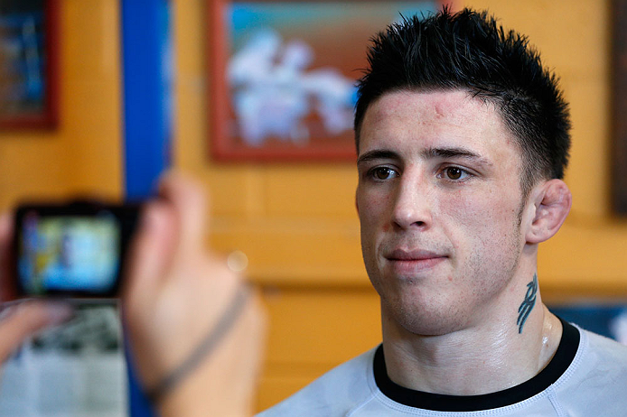 GOLD COAST, AUSTRALIA - DECEMBER 13: Norman Parke answers questions from journalists during the UFC on FX open workouts on December 13, 2012 at Boonchu Gym in Gold Coast, Australia. (Photo by Josh Hedges/Zuffa LLC/Zuffa LLC via Getty Images)
