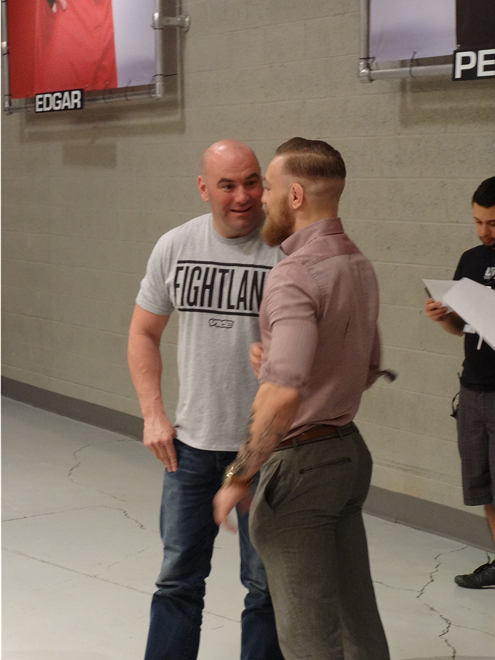 UFC president chats with featherweight Conor McGregor during the Ultimate Fighter 19 elimination fights.