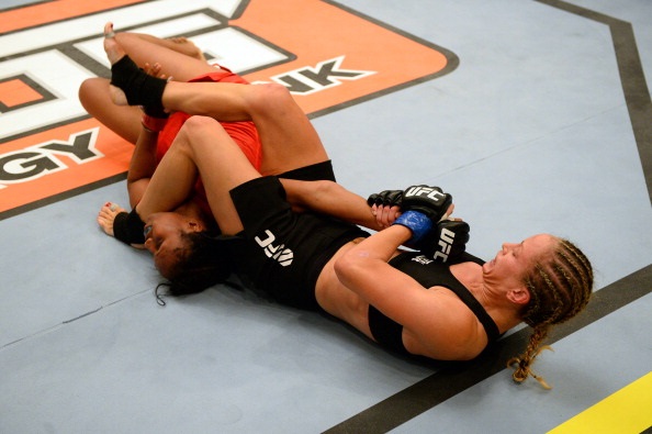 Berto struggles to escape Rakoczy's armbar Berto struggles to escape Rakoczy's armbar