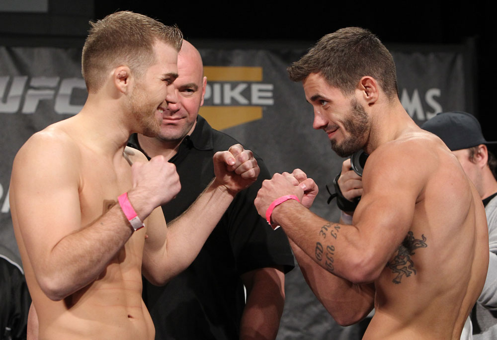 LAS VEGAS, NV - DECEMBER 02:  (L-R) Opponents Bryan Caraway and Dustin Neace face off after weighing in at the official weigh-in for The Ultimate Fighter 14 Finale at The Palms Casino Resort on December 2, 2011 in Las Vegas, Nevada.  (Photo by Josh Hedges/Zuffa LLC/Zuffa LLC via Getty Images)