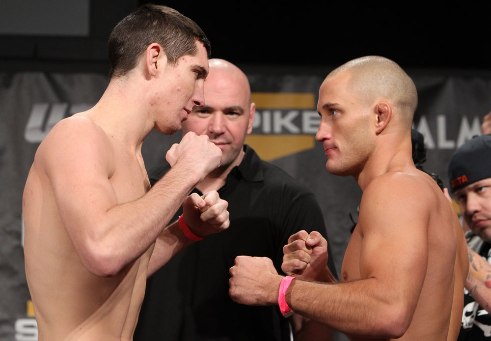 LAS VEGAS, NV - DECEMBER 02:  (L-R) Opponents Steven Siler and Josh Clopton face off after weighing in at the official weigh-in for The Ultimate Fighter 14 Finale at The Palms Casino Resort on December 2, 2011 in Las Vegas, Nevada.  (Photo by Josh Hedges/Zuffa LLC/Zuffa LLC via Getty Images)