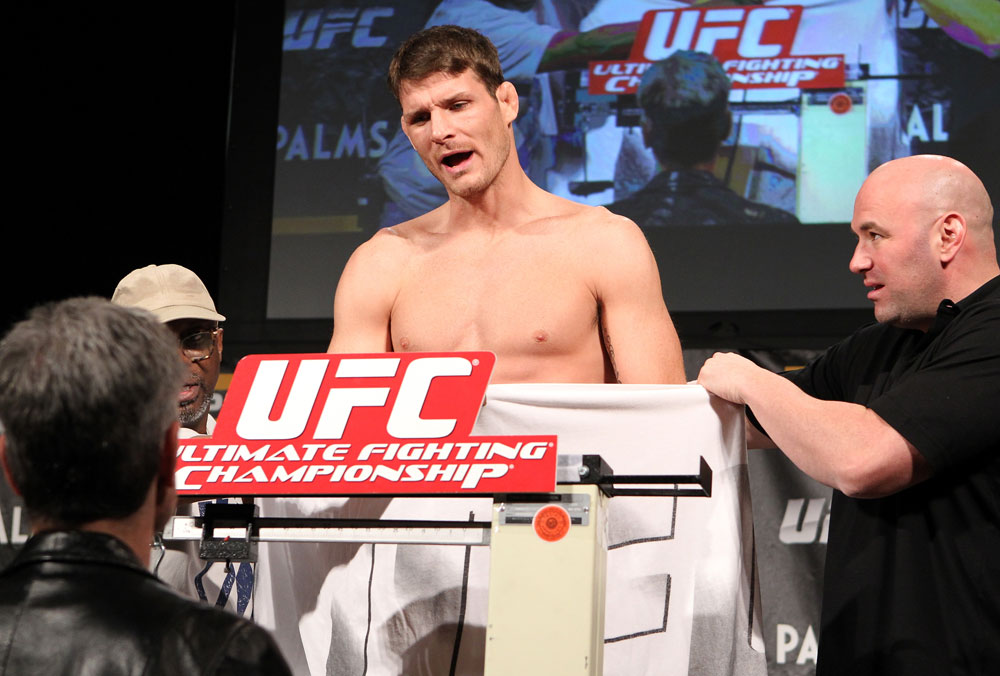 LAS VEGAS, NV - DECEMBER 02:  Michael Bisping pleads his case to a commission official after missing weight at the official weigh-in for The Ultimate Fighter 14 Finale at The Palms Casino Resort on December 2, 2011 in Las Vegas, Nevada.  (Photo by Josh Hedges/Zuffa LLC/Zuffa LLC via Getty Images)