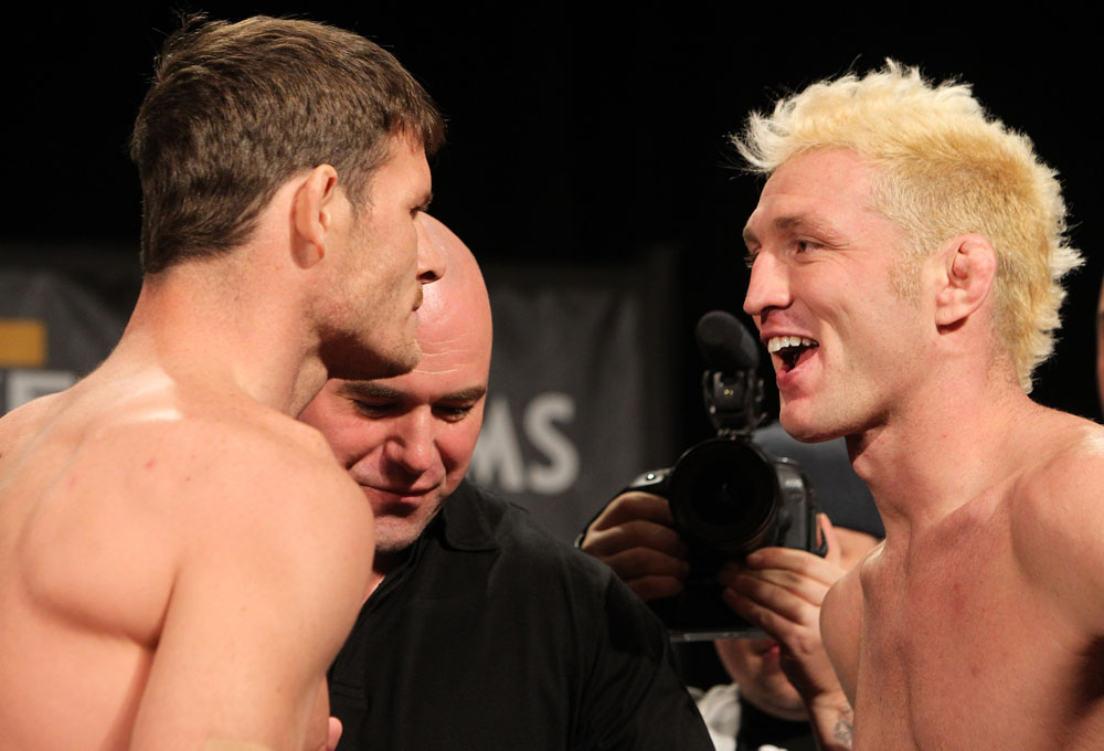 LAS VEGAS, NV - DECEMBER 02:  (L-R) Middleweight opponents Michael Bisping and Jason "Mayhem" Miller face off after weighing in at the official weigh-in for The Ultimate Fighter 14 Finale at The Palms Casino Resort on December 2, 2011 in Las Vegas, Nevada.  (Photo by Josh Hedges/Zuffa LLC/Zuffa LLC via Getty Images)