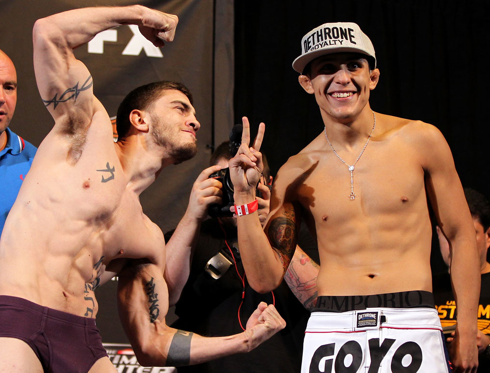 LAS VEGAS, NV - MAY 31:   (L-R) Opponents John Albert and Erik Perez face off after making weight during The Ultimate Fighter Live weigh in at the Palms Casino Resort on May 31, 2012 in Las Vegas, Nevada.  (Photo by Josh Hedges/Zuffa LLC/Zuffa LLC via Getty Images)  *** Local Caption *** John Albert; Erik Perez